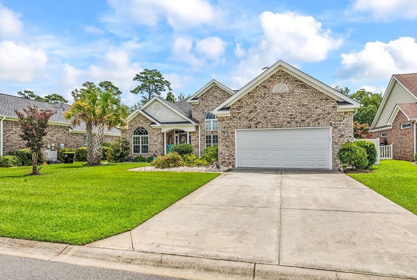 Welcome to this beautifully maintained custom-built home - photo 2