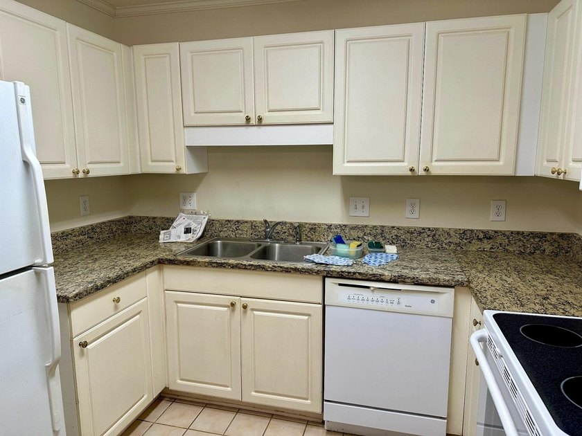 First floor unit! Come see this unit which is perfect to remodel - photo 6
