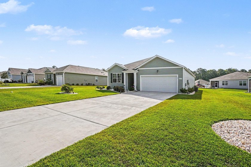 Welcome to 479 Samara Drive, a beautifully maintained home where - photo 3