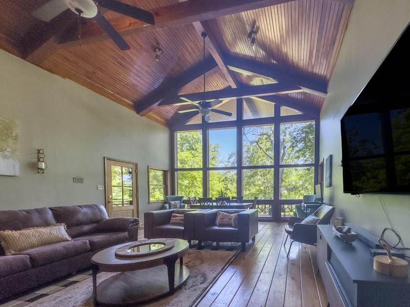 Enjoy lake life at its finest with this beautiful 4-bedroom - photo 2