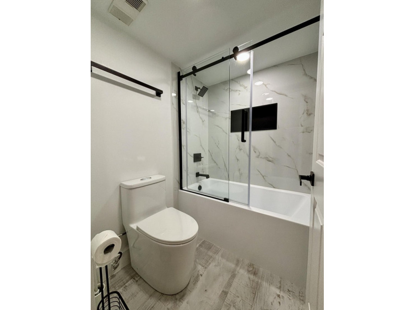 ONE LEVEL 1st floor condo is ready to move-in. Totally remodeled - photo 22