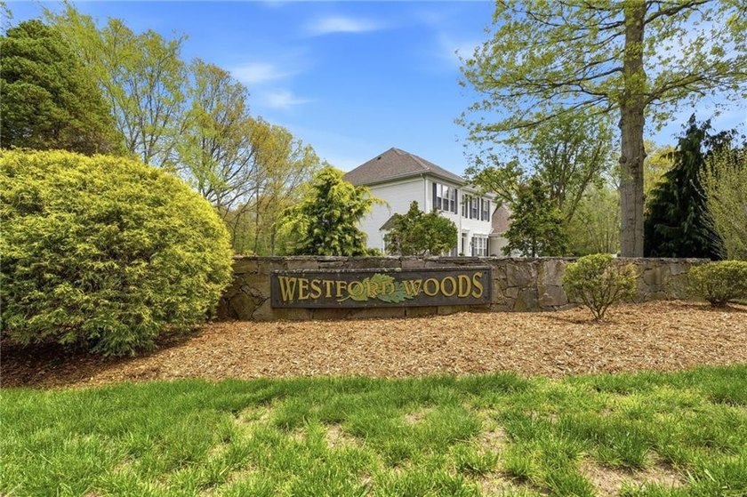 Welcome to Westford Woods! This beautifully maintained 4-bedroom - photo 8