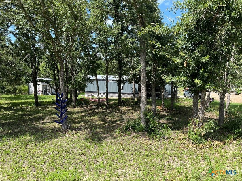 Welcome to 108 Live Oak Path in Somerville, TX! This charming - photo 6