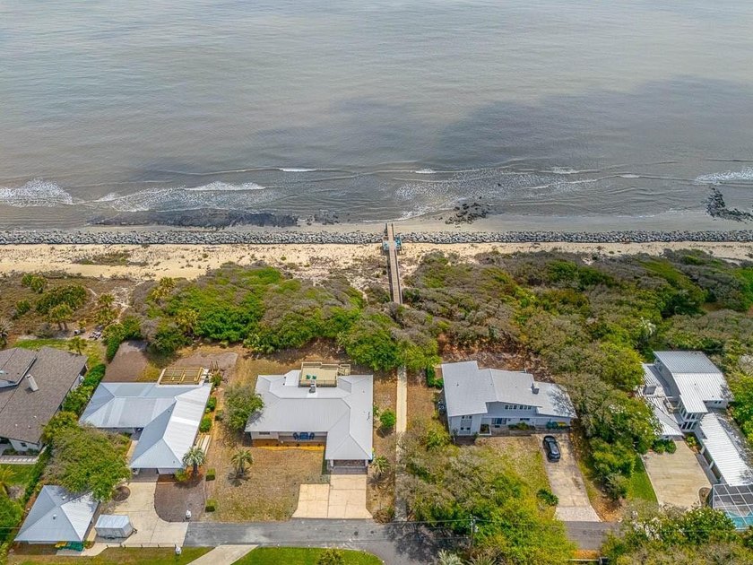 Experience the ultimate in coastal iving with this exceptional - photo 58