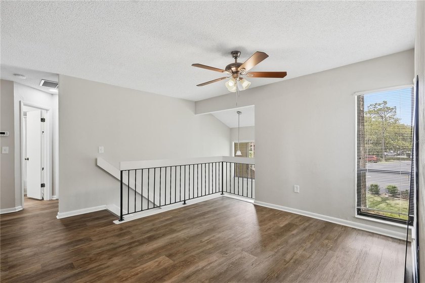 Welcome to this beautifully renovated second-floor condo in the - photo 5