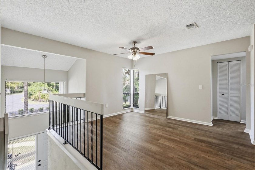 Welcome to this beautifully renovated second-floor condo in the - photo 7