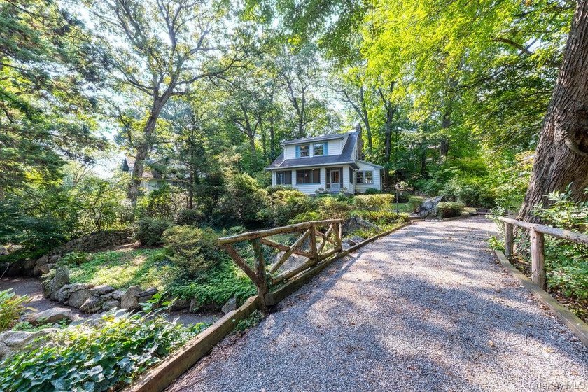 Classic Colonial Charm in a Picturesque warmth of Village Life! - photo 27