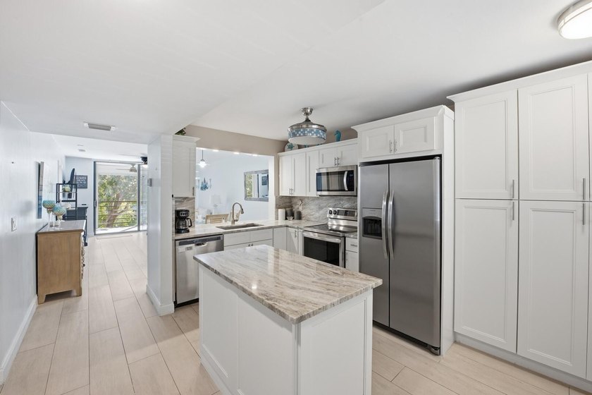Step into a thoughtfully updated residence in the Grandview at - photo 3