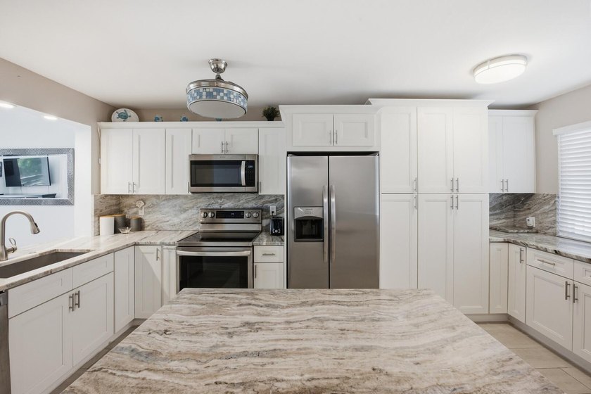 Step into a thoughtfully updated residence in the Grandview at - photo 6