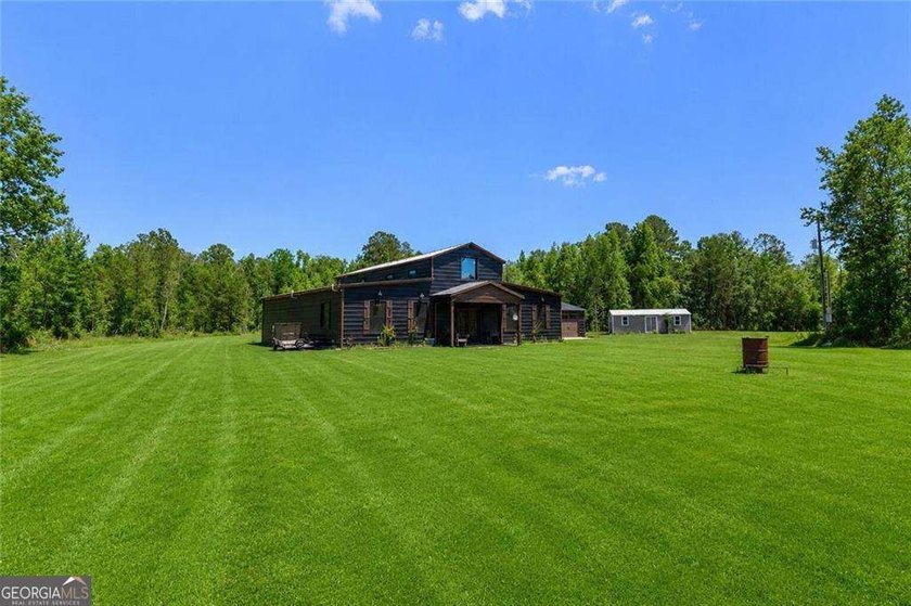 Modern barndominium on 10.28 private, wooded acres with TWO - photo 38