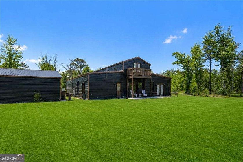 Modern barndominium on 10.28 private, wooded acres with TWO - photo 39