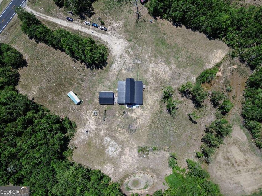 Modern barndominium on 10.28 private, wooded acres with TWO - photo 44