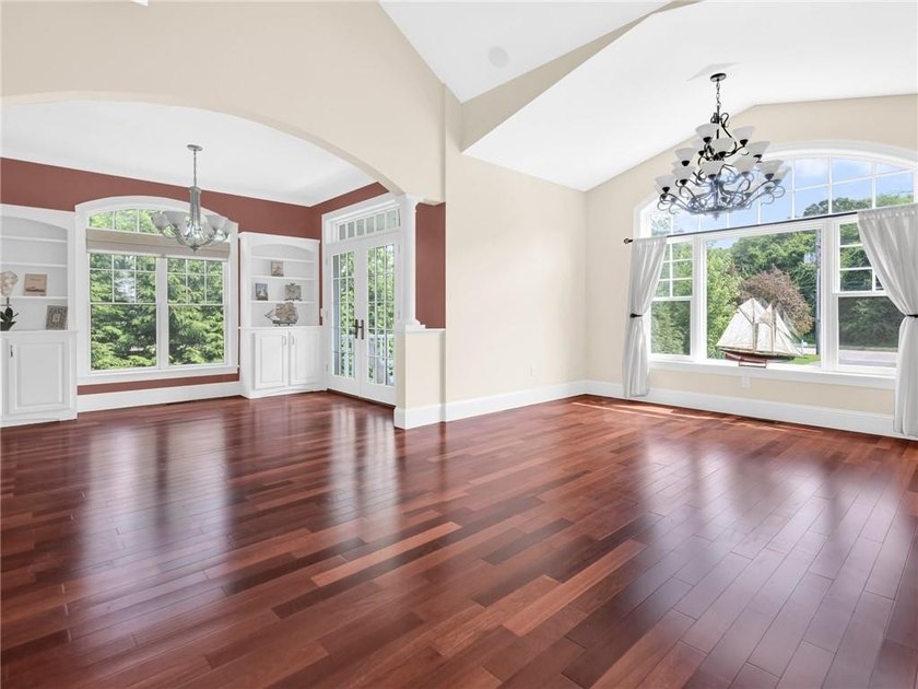 Nestled on a private and picturesque .83 acre lot set back from - photo 9