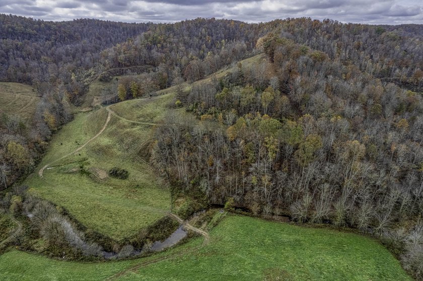 Tucked away among rolling valleys, towering ancient cliffs, and - photo 44