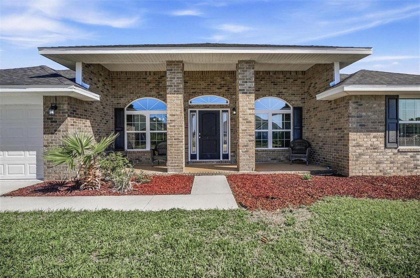 Welcome to this beautifully maintained Adams-built brick home - photo 6