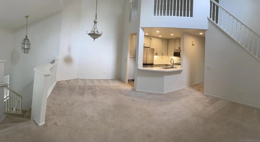 End unit in a private and quiet location overlooking trees in - photo 4