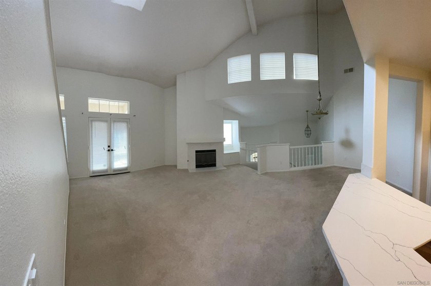End unit in a private and quiet location overlooking trees in - photo 5
