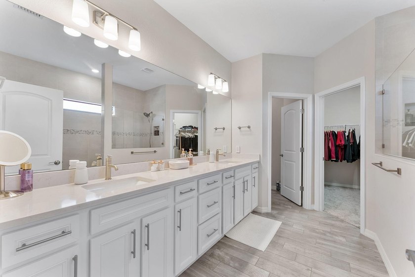 Introducing a stunning residence in the gated community of The - photo 16