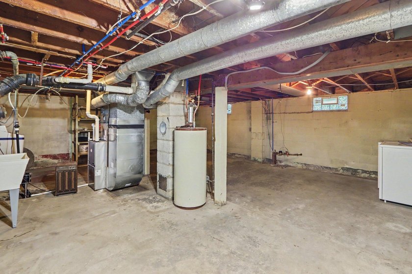 Welcome to this spacious 4-bedroom home, perfectly situated on a - photo 21