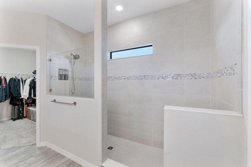 Introducing a stunning residence in the gated community of The - photo 24