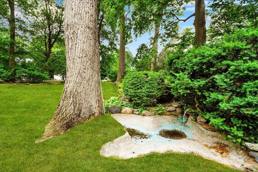 WELCOME HOME!! This charming brick Cape Cod with - photo 8