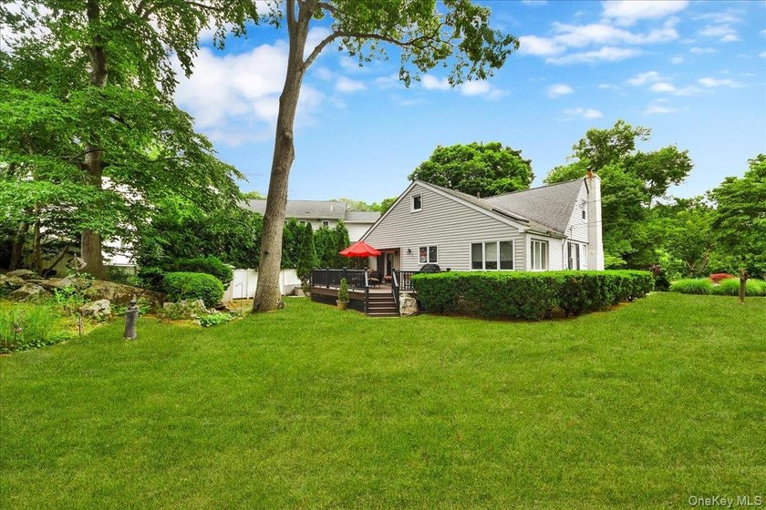 WELCOME HOME!! This charming brick Cape Cod with - photo 9