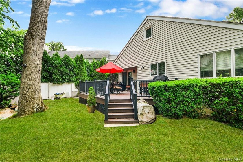 WELCOME HOME!! This charming brick Cape Cod with - photo 10