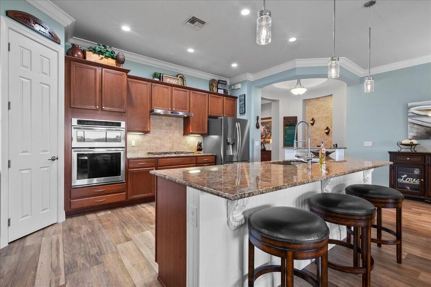 IMPACT DOORS &amp; WINDOWS ON ORDER. This beautifully upgraded home - photo 4