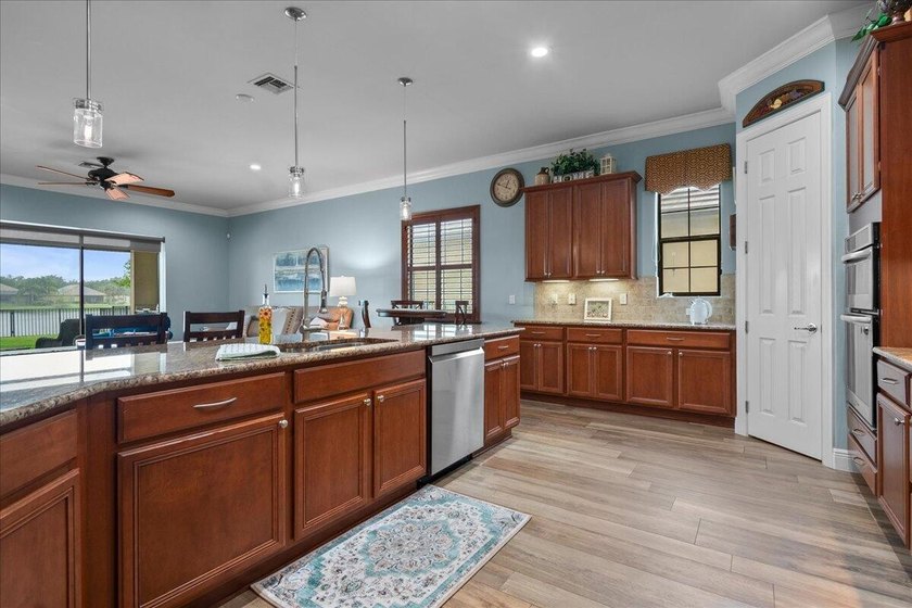 IMPACT DOORS &amp; WINDOWS ON ORDER. This beautifully upgraded home - photo 6