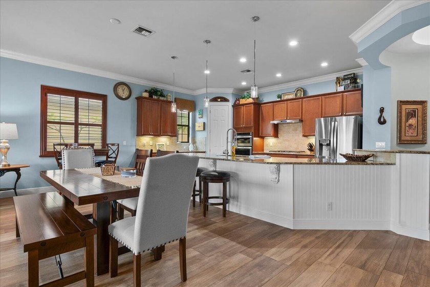 IMPACT DOORS &amp; WINDOWS ON ORDER. This beautifully upgraded home - photo 8