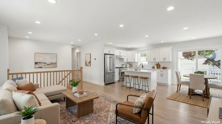 Welcome to 133B Shinnecock Avenue, a radiant gem nestled in - photo 2