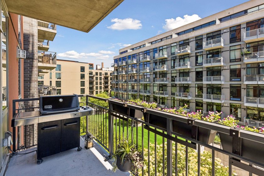 Absolutely stunning west-facing corner unit with expansive - photo 12