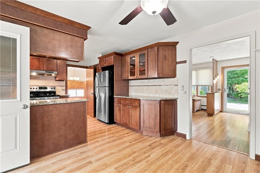 Welcome to this well-built, lovingly maintained ranch in the - photo 3