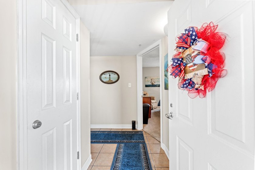 Welcome to this spacious 4-bedroom, 4-bath residence in the - photo 2