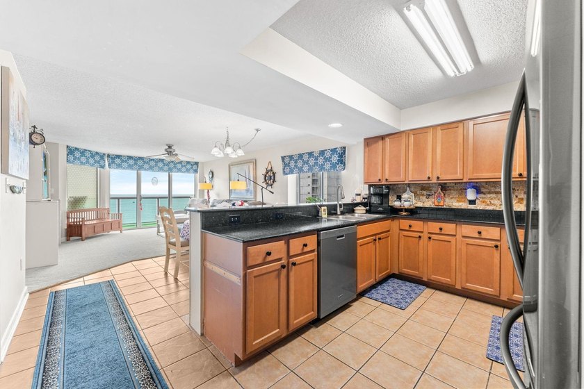 Welcome to this spacious 4-bedroom, 4-bath residence in the - photo 9