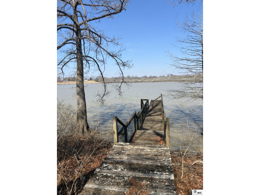 Water frontage lake lot with beautiful views of Lake Louie and - photo 6