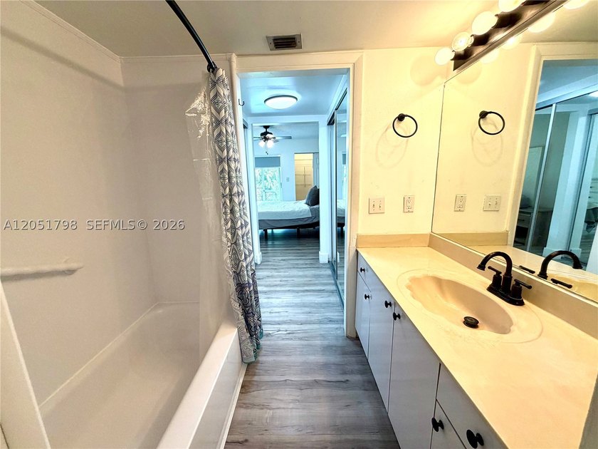 Welcome to this beautifully updated 1-bedroom, 1-bath condo - photo 18