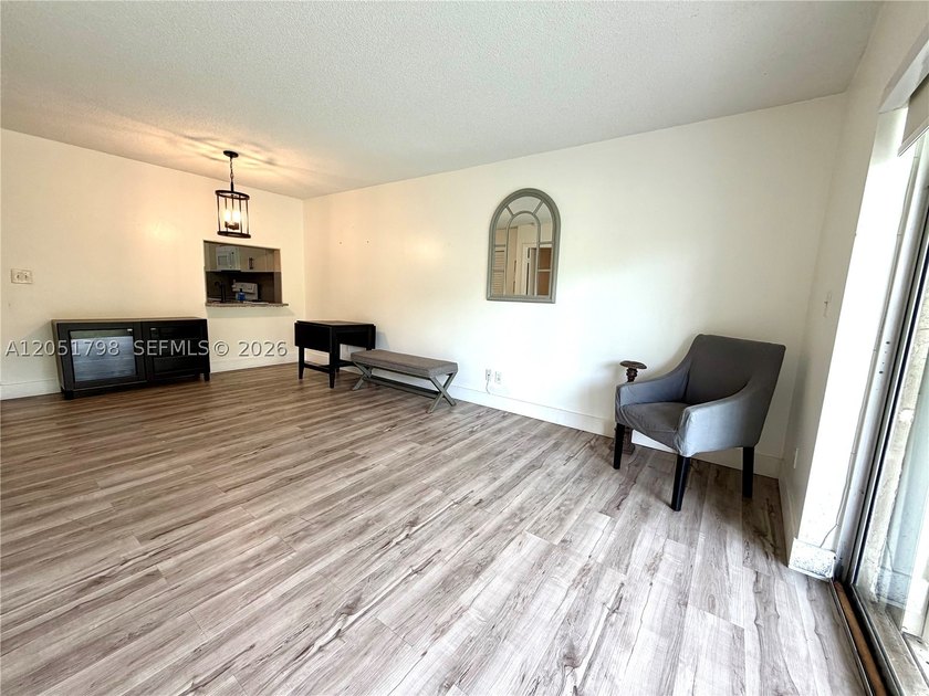 Welcome to this beautifully updated 1-bedroom, 1-bath condo - photo 19