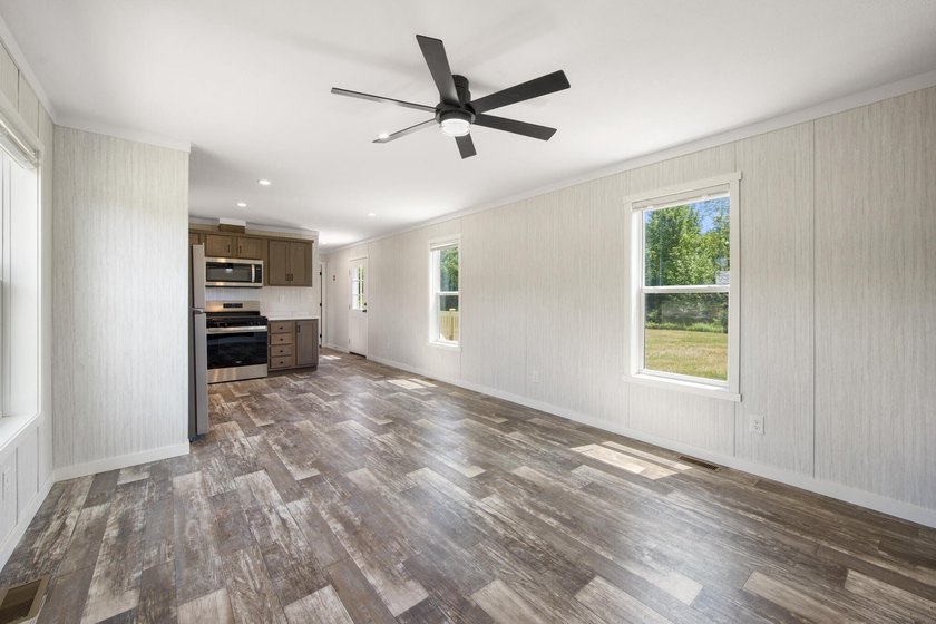 Welcome to easy, worry-free living in this brand-new 2-bedroom - photo 13