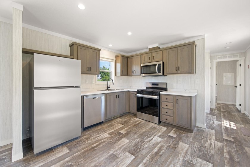 Welcome to easy, worry-free living in this brand-new 2-bedroom - photo 14