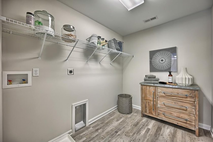 The Hamilton offered by Gemcraft Homes at Captains Cove. As you - photo 15