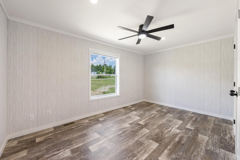 Welcome to easy, worry-free living in this brand-new 2-bedroom - photo 18