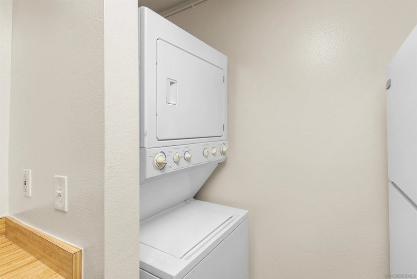 Tucked away in a peaceful setting within the desirable Allied - photo 8