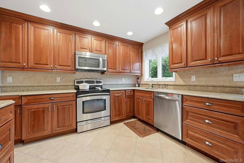 Welcome to 11 Cliftwood Drive, located in one of Huntington's - photo 9
