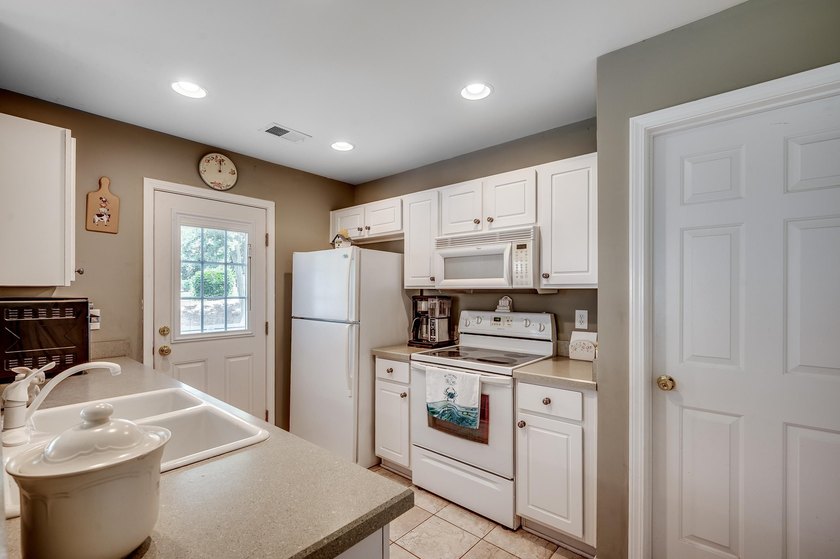 Welcome home to easy coastal living in Merritt Park, one of - photo 10