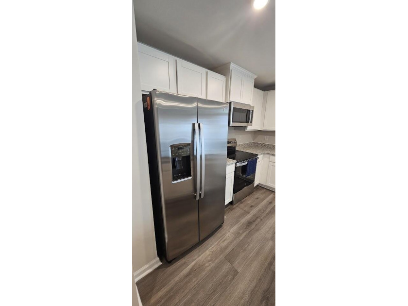 Sold Fully Furnish! Welcome to coastal living at its finest in - photo 11