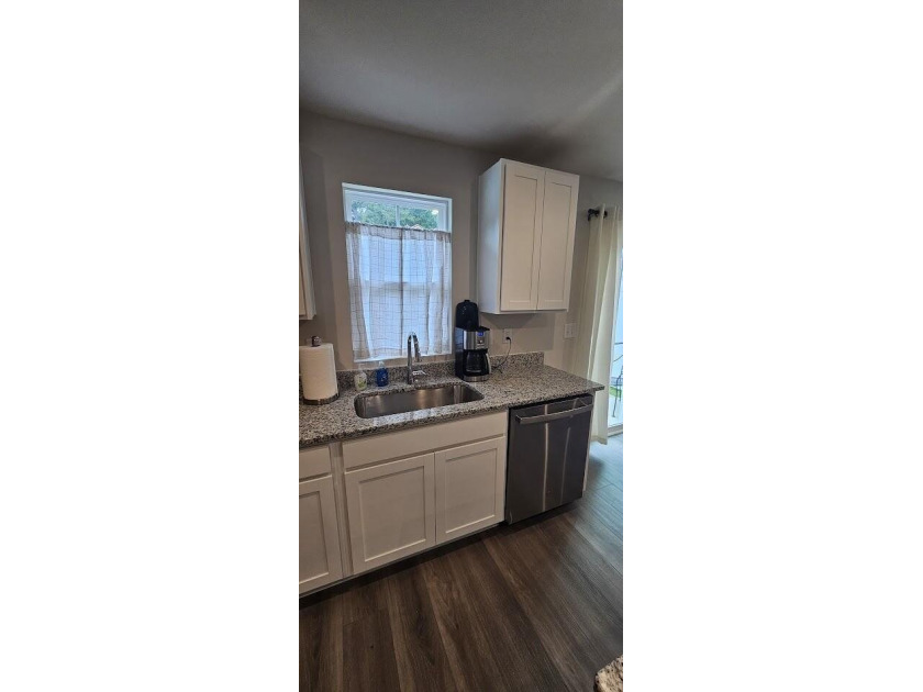 Sold Fully Furnish! Welcome to coastal living at its finest in - photo 12