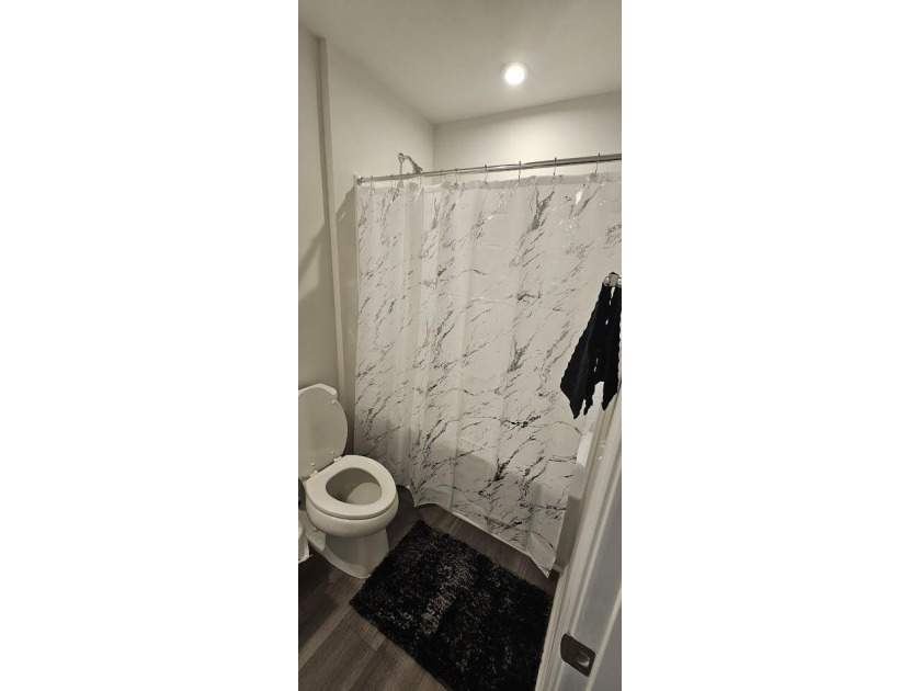 Sold Fully Furnish! Welcome to coastal living at its finest in - photo 18