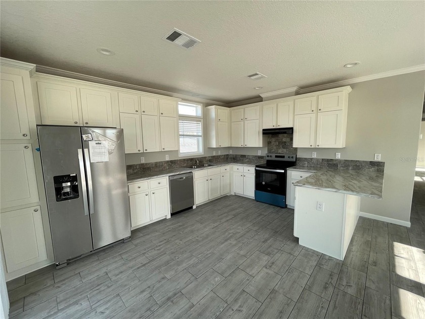 New 2025 Townhome. Premium building materials, 2x4 interior and - photo 2