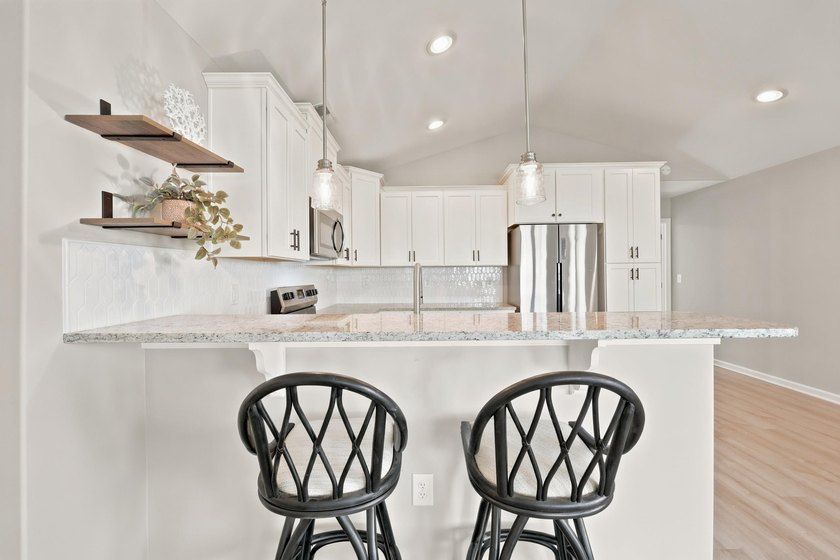 Welcome to this charming 3-bedroom, 2-bath home in the desirable - photo 4